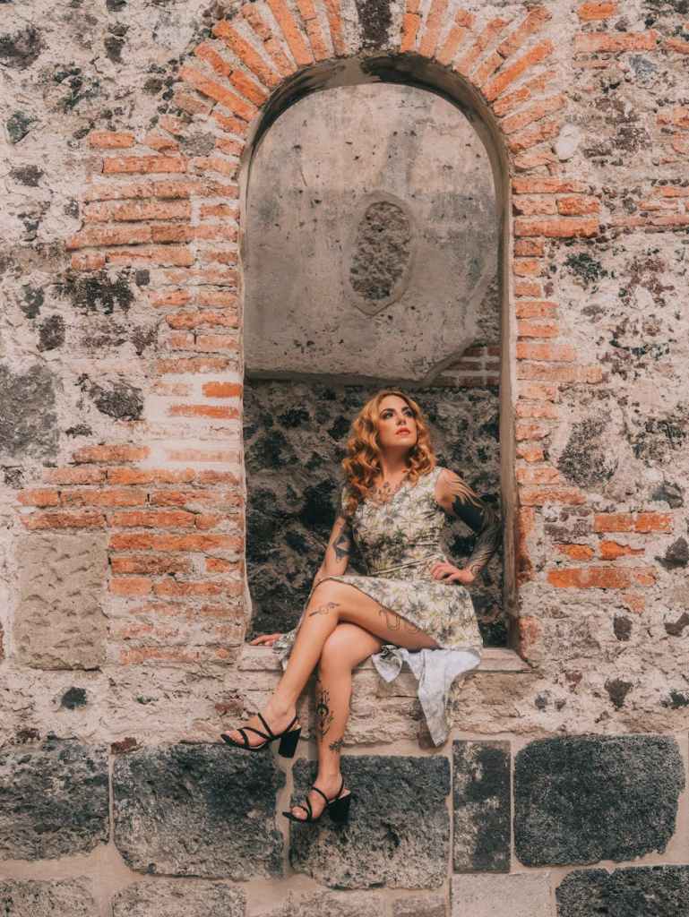 chic fashion portrait in historic mexico setting